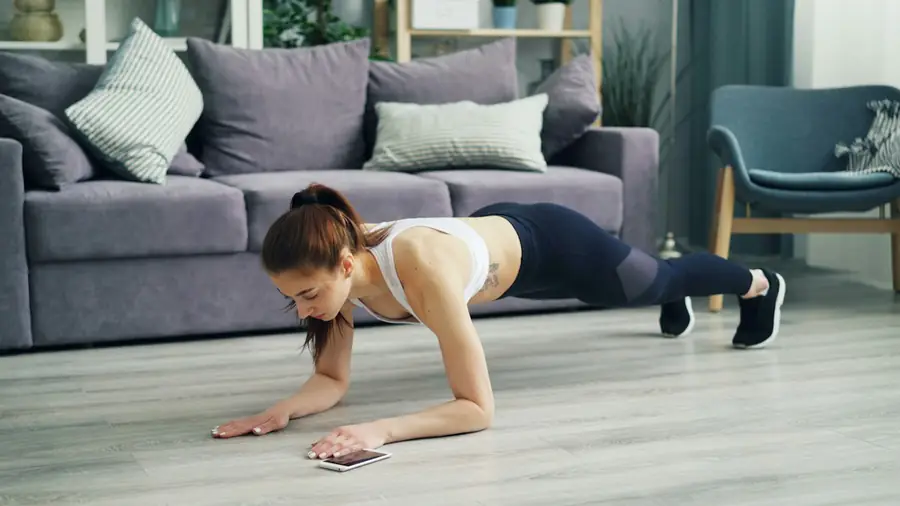 Woman doing push-ups at home